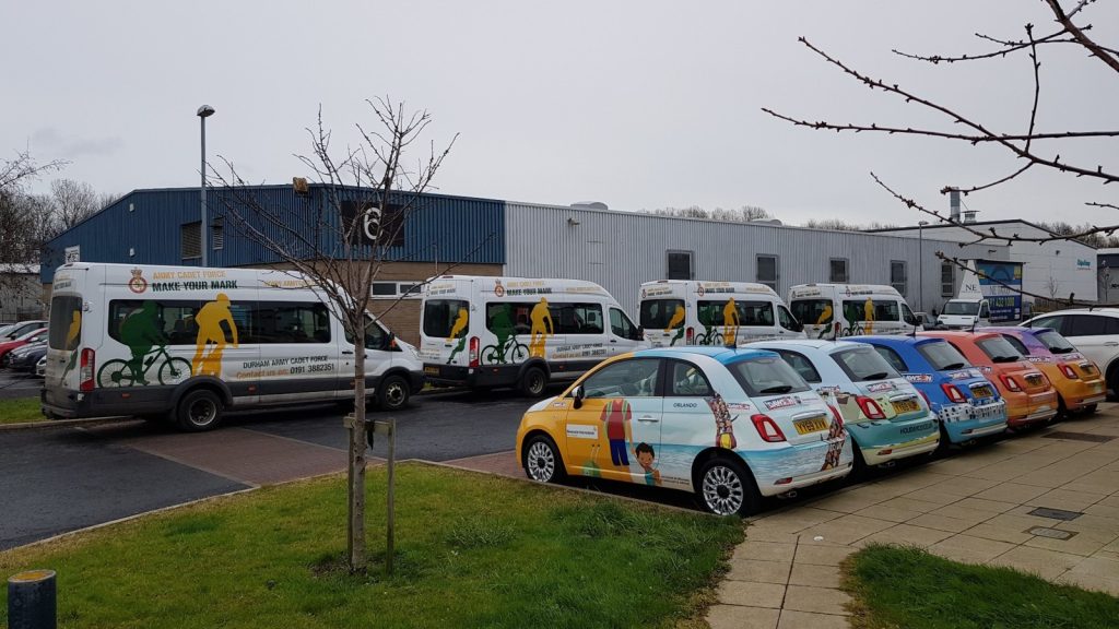 Fleet branding project in Newcastle showing multiple commercial vehicles wrapped for Durham Army Cadet Force